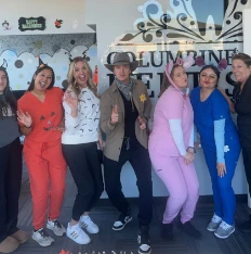 Team members dressed in Halloween costumes